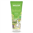 A green 200ml tube of Weleda Refresh Shower Cream featuring "Zesty Citrus" text and an illustration of a couple riding bicycles through a sunny countryside landscape with lemon trees.