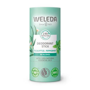 A light teal tube of Weleda Eucalyptus - Peppermint Deodorant Stick with illustrations of mint and eucalyptus leaves, featuring a "24h protection" icon and "no alcohol" label.