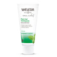 A white tube of Weleda Plant Gel Toothpaste with green accents, featuring a spearmint leaf illustration and "Spearmint Flavour" text.