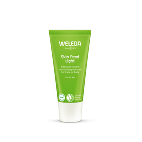 A bright green tube of Weleda Skin Food Light, a moisturizing skin care product for face or body, designed for dry skin.