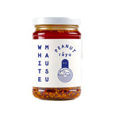 White Mausu Peanut Rāyu No. 01 chili oil condiment in a glass jar.