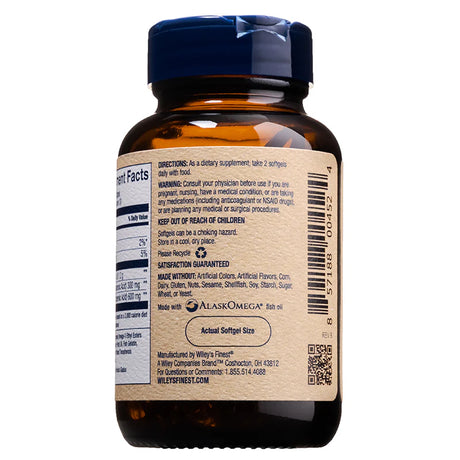 The back view of an amber glass bottle of Wiley's Finest Peak DHA, showing directions for use, a "Made Without" list, an "Actual Softgel Size" illustration, and a barcode on a tan label.
