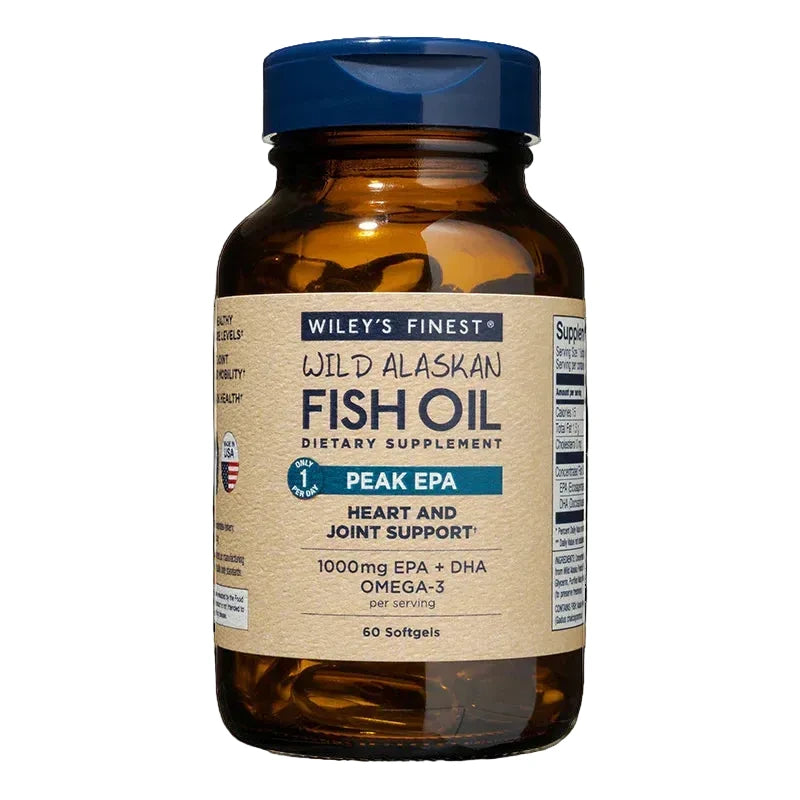 An amber glass bottle of Wiley's Finest Wild Alaskan Fish Oil Peak EPA dietary supplement, containing 60 softgels for heart and joint support, featuring a blue flip-top cap and a tan label.