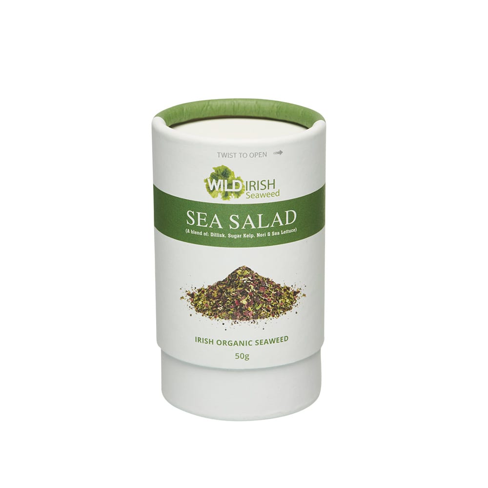 Cylindrical white shaker of Wild Irish Seaweed Sea Salad with a green label and a seaweed illustration.