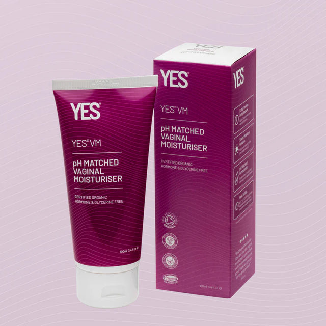 A tube and box of YES VM pH-matched vaginal moisturiser. The magenta-colored packaging is labelled as certified organic, hormone-free, and glycerine-free, with a volume of 100ml.