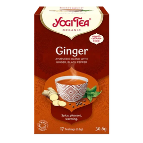 Yogi Tea Ginger tea box with a cup of tea and ginger root on a white background