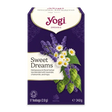 A box of Yogi Organic Sweet Dreams herbal tea blend, featuring a deep purple background with illustrations of lavender, chamomile, and hops alongside white daisies. The Yogi brand logo is clearly visible at the top.