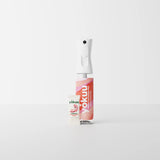 White Yokuu Probiotic Anti-Allergen Spray bottle with a white nozzle, pink label, and a matching refill sachet.
