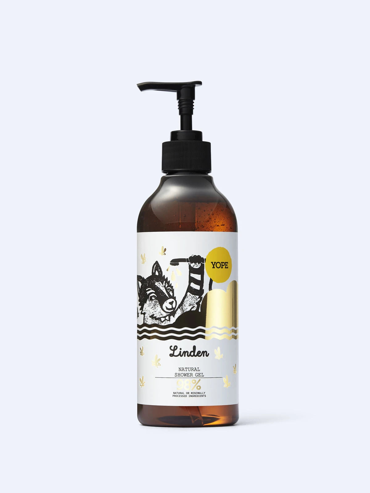 A bottle of Linden Natural Shower Gel with a black pump dispenser and a white label featuring a black illustration of a dog and a sheep, on a light gray background.