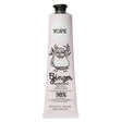A light pink tube of YOPE Ginger & Sandalwood natural hand cream featuring an illustration of an owl, labelled as 98% low-processed ingredients of natural origin.