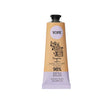 A tan and light purple tube of YOPE Tangerine and Raspberry natural hand cream featuring an illustration of a pig, labelled as 98% ingredients of natural origin.