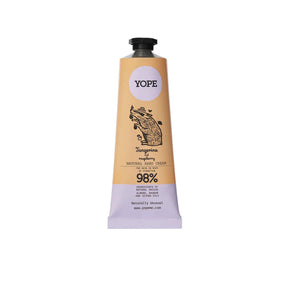 A tan and light purple tube of YOPE Tangerine and Raspberry natural hand cream featuring an illustration of a pig, labelled as 98% ingredients of natural origin.