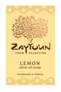 A rectangular soap bar labeled 'Zaytoun From Palestine Lemon olive oil soap' on a pale yellow background with decorative floral borders and a stylized tree logo.