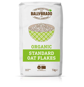 Package of Ballybrado Organic Standard Oat Flakes. The white bag features a green bowl graphic and text, emphasizing natural, wholesome ingredients.
