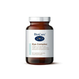 A 60-capsule amber glass jar of BioCare Eye Complex food supplement with a white and light blue label and silver cap, isolated on a white background.