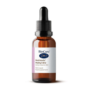 A 15ml amber glass dropper bottle of BioCare Nutrisorb Methyl B12 active vitamin B12 liquid food supplement with a white and purple label, isolated on a white background.