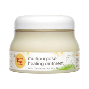 Burt's Bees Baby Multipurpose Healing Ointment in a clear plastic jar with a white lid, showing the light beige ointment inside. The label features the Burt's Bees logo and a cartoon bear.