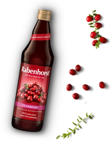 "Rabenhorst 100% pure cranberry juice from first pressing, featuring a premium glass bottle surrounded by fresh cranberries.