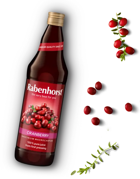 "Rabenhorst 100% pure cranberry juice from first pressing, featuring a premium glass bottle surrounded by fresh cranberries.