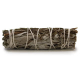 "A hand-tied sage and rosemary cleansing bundle, secured with natural cotton twine."