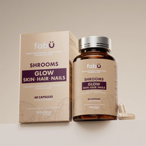 Fabü shrooms supplement bottle and packaging on a beige background