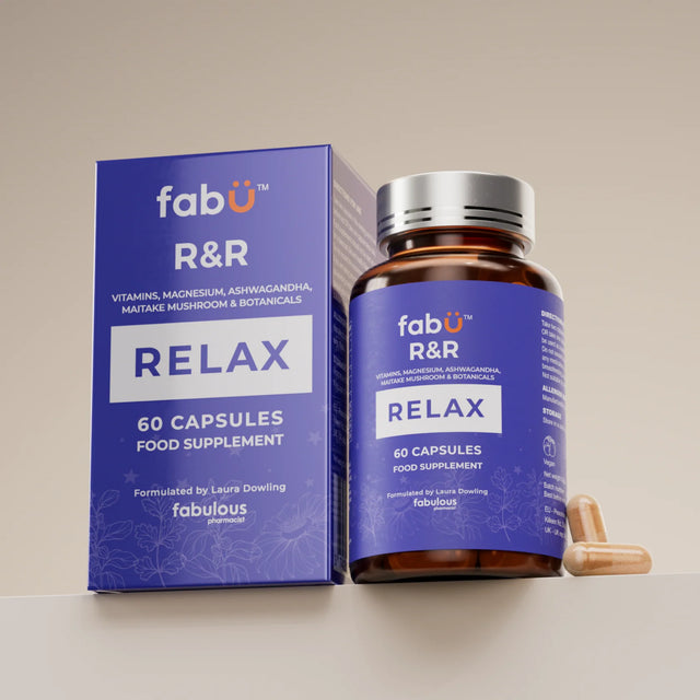 Supplement bottle and packaging labeled 'fabÜl R&R Relax' on a beige background