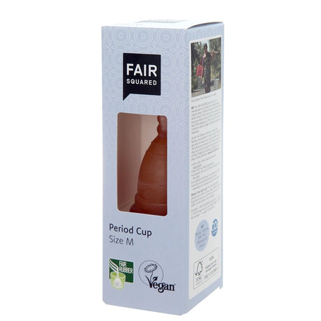 Blue and white packaging of a Fair Squared menstrual cup with a transparent window showing the cup. Labels: "Fair Rubber" and "Vegan," size M.