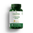 Macanta L-Theanine supplement bottle with capsules and leaves on a green background