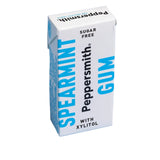 A Peppersmith Spearmint Gum carton, white with blue and black text, standing on a light blue background.
