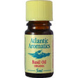 Atlantic Aromatics organic basil essential oil in a 5ml amber glass bottle with a yellow cap.