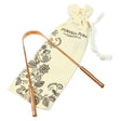 Ayurveda Pura London pure copper tongue scraper with decorative cotton storage pouch.