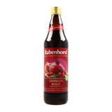 Dark brown bottle with golden cap, featuring a vibrant red label depicting pomegranates. Text reads "Rabenhorst," indicating premium quality juice.