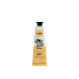 A yellow-and-white tube of YOPE Linden natural hand cream featuring an illustration of a raccoon, labelled as 98% minimally processed ingredients of natural origin.